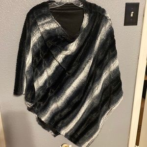 Faux fur poncho. Very soft.